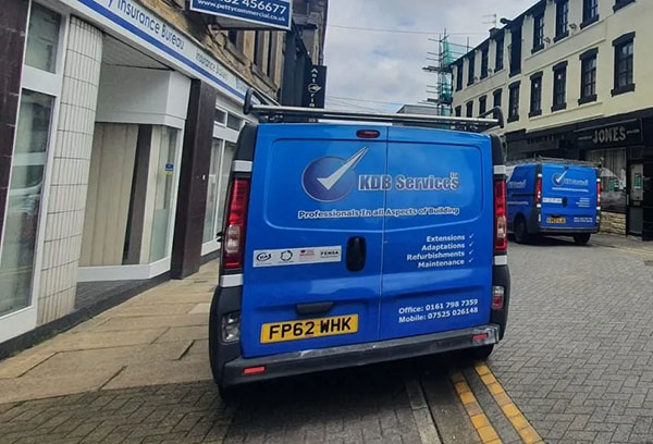 KDB Services company vans parked in Burnley